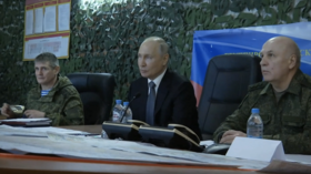 Putin makes surprise visit near military front line
