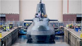Secret $1.6 billion submarine plans found in pub toilet – media
