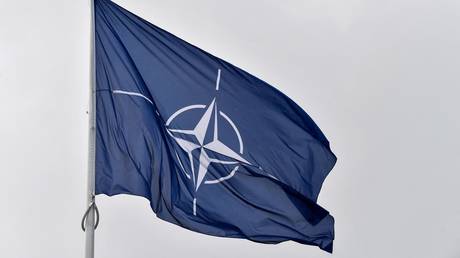 A flag of NATO flies at its headquarters in Brussels.
John THYS / AFP