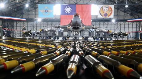 FILE PHOTO: A US-made F-16V fighter jet with ammunition on display at a military base in Chiayi, Taiwan