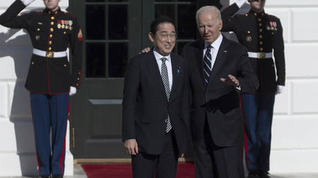 FILE PHOTO. U.S. President Joe Biden poses for photos with Japanese Prime Minister Kishida Fumio after his arrival on the South Lawn of the White House on January 13, 2023 in Washington, DC.