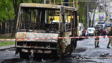 A passenger bus destroyed by Ukrainian shelling in Donetsk, Donetsk People's Republic, Russia.