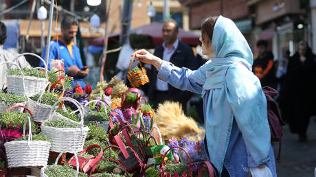 People do shopping within preparations for the Nowruz in Tehran, Iran on March 17, 2023.