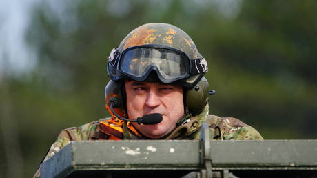 FILE PHOTO: British Defence Secretary Ben Wallace visits a military base in Dorset to see Ukrainian soldiers train.
