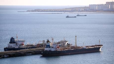 Tankers stand at a transshipment complex in Novorossiysk, Russia.