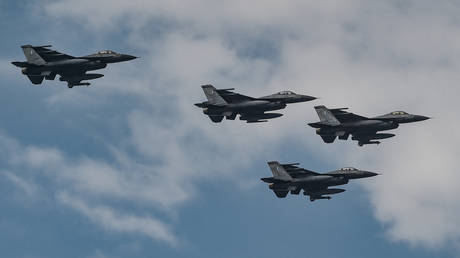 FILE PHOTO: F-16 fighter jets fly during a military parade in Thessaloniki, Greece.