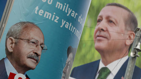 Campaign posters of the 13th Presidential candidate and Republican People's Party (CHP) Chairman Kemal Klçdarolu (L) and the President of the Republic of Turkey and Justice Development Party (AKP) President Recep Tayyip Erdoan (R) are seen displayed.
