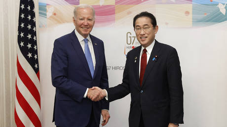 US President Joe Biden (L) and Japanese PM Fumio Kishida meet in Hiroshima on May 18, 2023, ahead of the G7 summit.