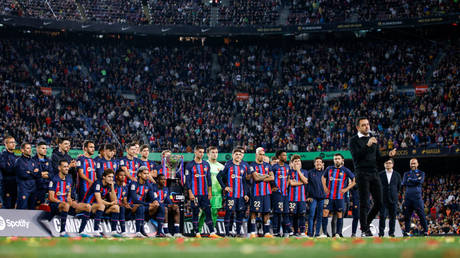 FC Barcelona head coach Xavi Hernandez celebrates winning the La Liga title after the match against Real Sociedad at Spotify Camp Nou in Barcelona, Spain, on May 20, 2023.