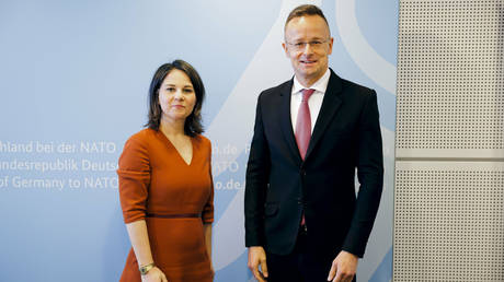 German Minister of Foreign Affairs Annalena Baerbock (L) and  Hungarian Trade and Foreign Minister Peter Szijjarto (R).