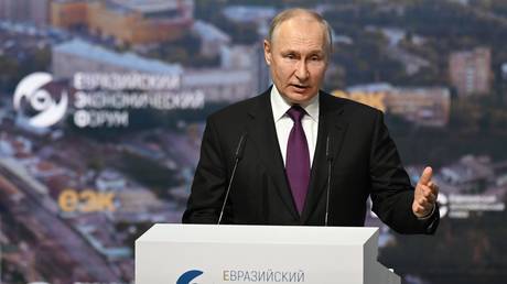 Russian President Vladimir Putin delivers a speech during a plenary session of the Eurasian Economic Forum in Moscow, Russia.