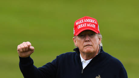 Former US president and 2024 presidential hopeful Donald Trump plays golf in Turnberry, Scotland, UK
