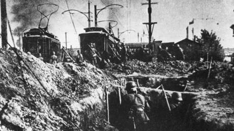 Nazi German troops in the suburbs of Warsaw during World War II.