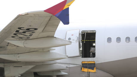 An Asiana Airlines plane is parked as one of the plane's doors suddenly opened at Daegu International Airport in Daegu, South Korea, May 26, 2023