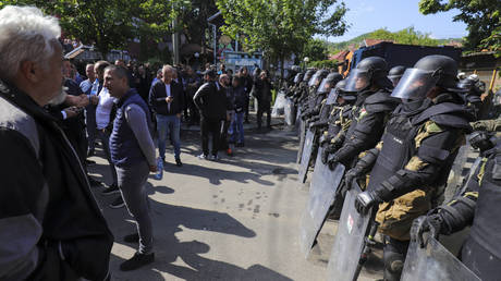 KFOR soldiers face off against protesters in Zvecan, Kosovo, May 29, 2023