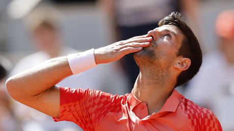 Novak Djokovic celebrates after winning the first round match of the French Open at the Roland Garros stadium in Paris, France, May 29, 2023