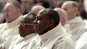 Pope defrocks priest accused of genocide