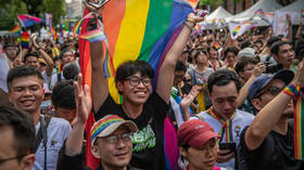 Taiwan allows same-sex couples to adopt children