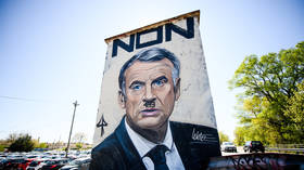 France investigates posters likening Macron to Hitler