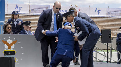 Joe Biden falls on stage during the 2023 United States Air Force Academy Graduation Ceremony in Colorado Springs, Colorado, June 1, 2023