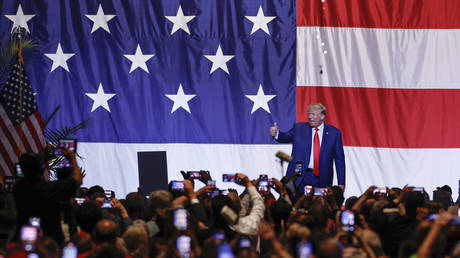 Former U.S. President Donald Trump walks offstage after his remarks at the Georgia state GOP convention at the Columbus Convention and Trade Center on June 10, 2023 in Columbus, Georgia