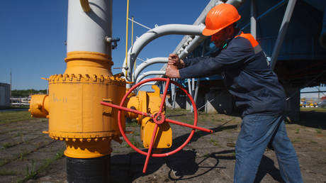 An employee tightens the valve on a pipeline at the Bilche-Volytsko-Uherske underground gas storage facility in western Ukraine.