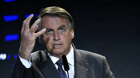 Jair Bolsonaro gestures during a meeting with businessmen promoted by the National Confederation of Industry (CNI) on December 07, 2021 in Brasília, Brazil