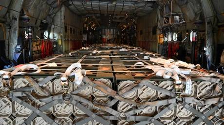 FILE PHOTO: Pallets of ammunition bound for Ukraine are loaded aboard a US military transport plane at Ramstein Air Base, Germany, August 7, 2022.