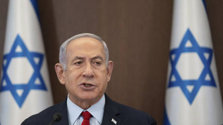 Israeli Prime Minister Benjamin Netanyahu chairs a cabinet meeting at his office in Jerusalem, on June 18, 2023.