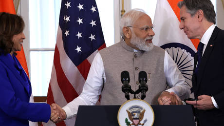 Indian Prime Minister Narendra Modi (C) shakes hands with U.S. Secretary of State Antony Blinken (R) and U.S. Vice President Kamala Harris (L) during a luncheon at the Department of State on June 23, 2023 in Washington, DC