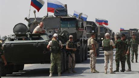 FILE PHOTO: A Russian military convoy pauses near Kamisli, Syria.