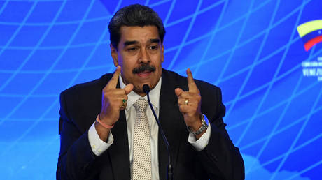 Venezuelan President Nicolas Maduro speaks during a joint press statement with Iranian President Ebrahim Raisi in Caracas, on June 12, 2023.