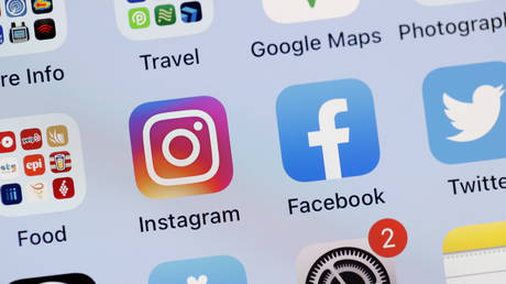 In this photo illustration, the Facebook and Instagram apps are seen on the screen of an iPhone on October 04, 2021 in San Anselmo, California