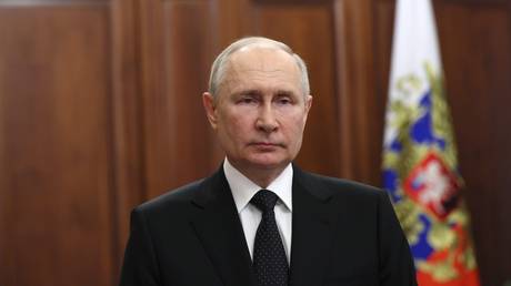 Russian President Vladimir Putin delivers a televised address