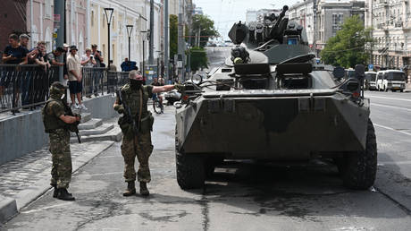 Servicemen and military equipment of Russia's private military company Wagner Group are seen on a street in Rostov-on-Don, Russia.