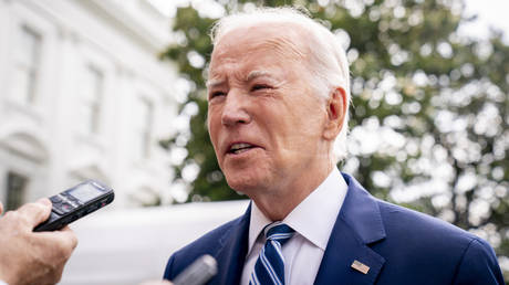 President Joe Biden speaks with reporters on the south lawn of the White House, with visible markings from a CPAP machine on his face, in Washington, DC, June 28, 2023.