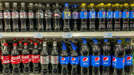 FILE PHOTO: Pepsi and Coca-Cola soda drinks in a Chinese supermarket