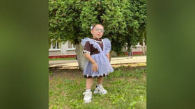 Shortest girl in Russia graduates from school