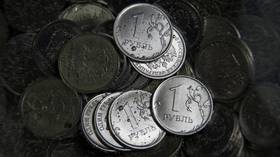 Ruble sinks to 15-month low