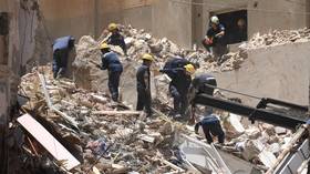 High-rise building collapses in Egypt