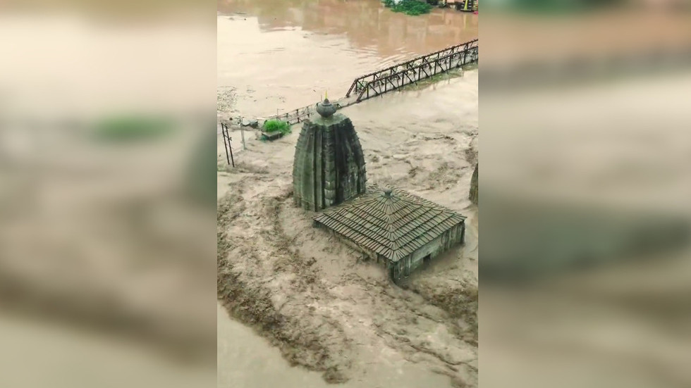 Dozens dead, hundreds stranded after torrential rains in northern India ...