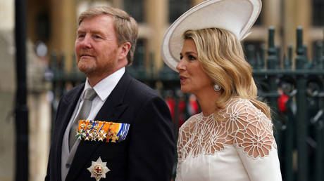 King Willem-Alexander and Queen Maxima of the Netherlands arrive at London's Westminster Abbey before the May 6 coronation ceremony of British King Charles III.