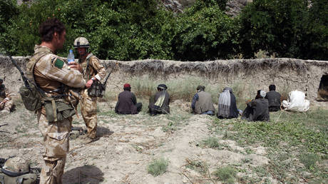 FILE PHOTO : British paratroopers detain suspected Taliban militants