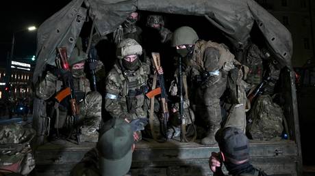 Members of the Wagner private military company leaving the area of the Southern Military District headquarters in Rostov-on-Don, Russia.