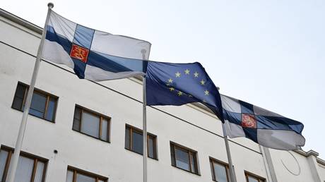 The Finnish and the EU flags are seen outside the embassy of Finland in Moscow.