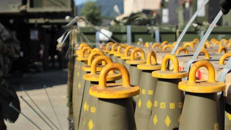 155mm Dual Purpose Improved Conventional Munitions rounds wait to be loaded into M109A6 Paladin self-propelled howitzers and M992 Field Artillery Support Vehicles at Camp Hovey, South Korea, September 20, 2016