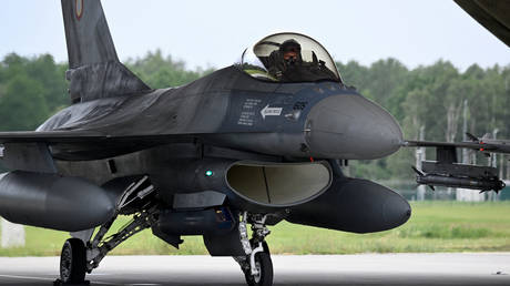 A Romanian Air Force F-16 fighter sits on the tarmac of Siauliai airbase in Lithuania during the NATO exercise, on July 4, 2023.