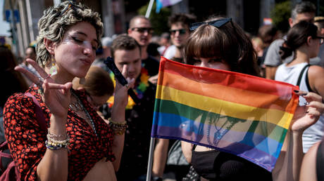 Demonstrators march during the annual Pride parade on July 24, 2021 in Budapest, Hungary.