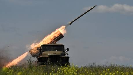 FILE PHOTO: Ukrainian servicemen fire a Grad multiple rocket launcher towards Russian positions near Artyomovsk (Bakhmut).