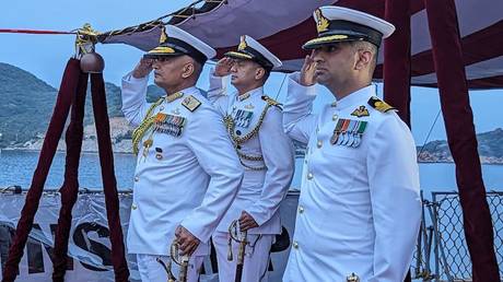 Officers of the Indian Navy seen carrying batons at handing-over ceremony of 32-year-old missile corvette, INS Kirpan, to the Vietnam Navy on July 22, 2023.